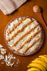 Delicious Banana Dessert Pizza with Caramel and White Chocolate