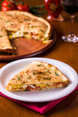 Delicious Homemade Savory Pie with Fresh Rosemary Garnish