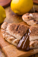 Warm Caramel Dessert with Cinnamon and Fresh Lemons