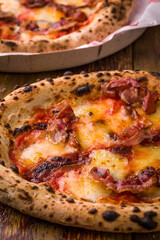 Delicious Crispy Pizza With Melted Cheese and Bacon Toppings