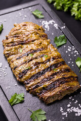 Grilled Fraldinha Beef Steak on Slate Plate with Moustard Seasoning and Herbs