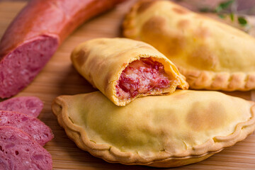 Delicious Sausage Empanadas with Filling on Display