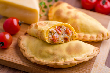 Delicious Homemade Empanadas with Fresh Tomato and Cheese Filling