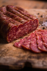 Rustic Artisan Salami Slices on Wooden Cutting Board
