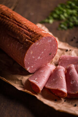 Close-Up of Sliced Mortadela on Rustic Wooden Tabletop