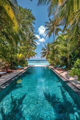 Serene tropical swimming pool surrounded by palm trees and ocean views on a sunny day