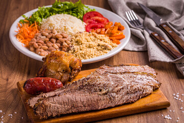 Delicious Brazilian Barbecue with Rice, Vegetables, and Beans