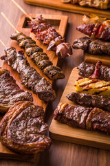 Delicious Grilled Meat Skewers on Wooden Serving Boards