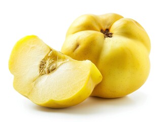 A whole quince with a slice showing the inside on a white background