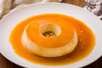Delicious Brazilian Pudim Flan Dessert with Caramel Sauce on Plate