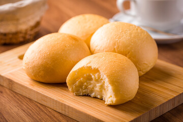 Freshly Baked Cheese Breads on Wooden Cutting Board