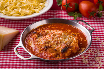 Delicious Chicken Parmesan with Pasta and Fresh Tomatoes
