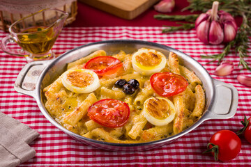 Delicious Baked Penne Pasta Dish with Fresh Tomatoes and Eggs