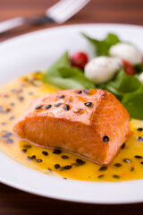 Delicious Grilled Salmon with Passion Fruit Sauce and Salad