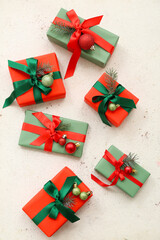 Gift boxes and Christmas balls on white background