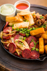 Delicious Brazilian Dish with Sausages and Fried Yuca