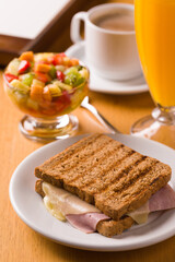 Healthy Breakfast with Toast, Fresh Fruit Salad, and Coffee