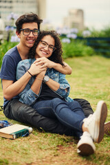 Naklejka premium Couple, teenager and portrait outdoor for relax, bonding and hug together on weekend with romance. Boy, girl and smile for relationship support, embrace and happiness in park with love connection
