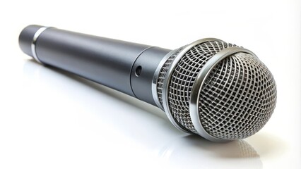 Sleek and modern microphone is lying on a reflective surface, ready to amplify sound and capture audio