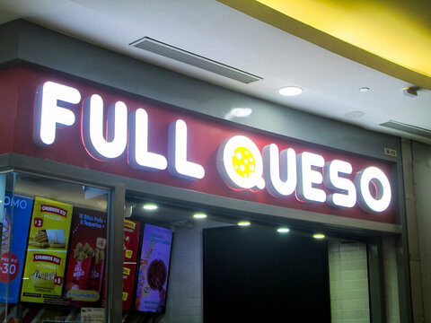 Full Queso is a fast food restaurant that offers teque&ntilde;os (to eat on site and frozen to take away), pizzas, churros and ice cream.Editorial, Editorial Ilustrative.Caracas, Venezuela October 15, 2024.