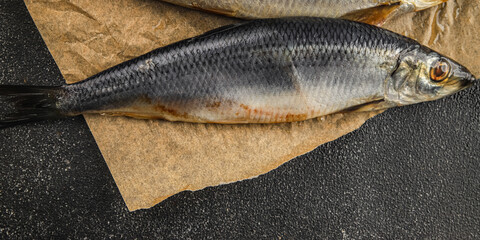 Herring fresh fish seafood pescetarianism tasty food dish fresh delicious gourmet food background on the table rustic food top view copy space top view keto and paleo diet vegetarian