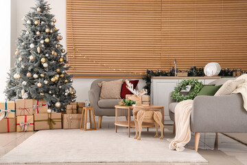 Interior of festive open space kitchen with Christmas decorations
