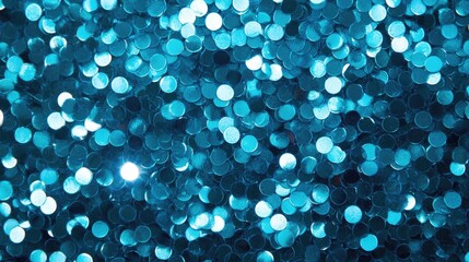 Festive sparkling background featuring round iridescent turquoise sequins on fabric