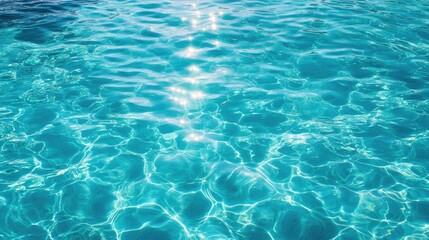 Crystal clear turquoise lagoon with azure water surface resembling a swimming pool showcasing the beauty of the blue rippling sea