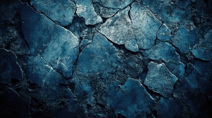 Dark blue abstract texture featuring stone and concrete elements perfect for banners and backgrounds enhanced with a vignette effect