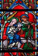 Obraz premium 2024-10-16, Auxerre, FRANCE. Stained glass (17th century) of Holy Family: The Escape to Egypt.