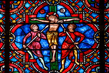 2024-10-16, Auxerre, FRANCE. Stained glass (17th century) of Jesus Christ crucified on the cross.