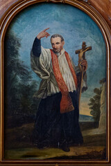 Naklejka premium 2024-10-16, Auxerre, FRANCE. Painting (19th century) of Saint Vincent de Paul. Saint of the Roman Catholic Church..