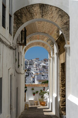 Arches of the Jewish quarter in the historical center of the white beautiful village of Vejer de la Frontera in a sunny day, Cadiz province, Andalusia, Spain © JoseLuis