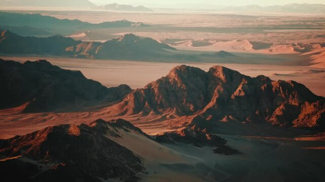 Aerial view from an airplane of Mountains and dunes in the desert of Namibia Africa