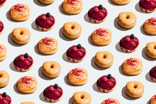 Pattern of Vegan Donuts with Classic Glaze, Cheesecake, and Strawberry Cream