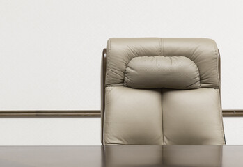 Leather office beige armchair with wooden table