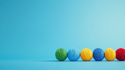 Colorful Yarn Balls on Blue Background