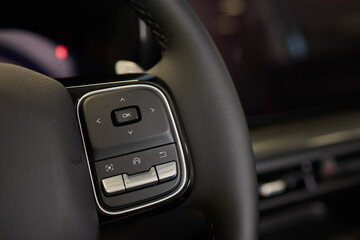 The modern cars steering wheel control panel boosts convenience and performance