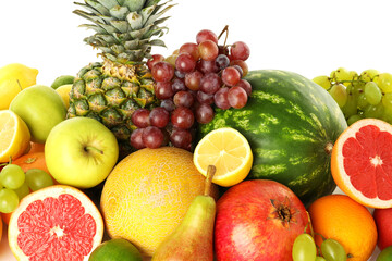Many different fresh fruits isolated on white