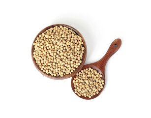 Soy beans in bowl and spoon isolated on white, top view