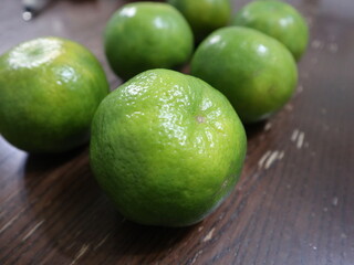 fresh food background of  green tangerines design for healthy diet