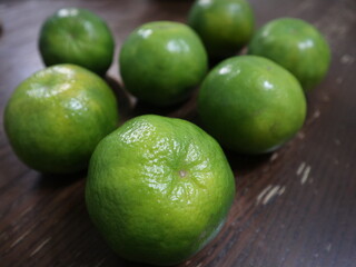 fresh food background of  green tangerines design for healthy diet