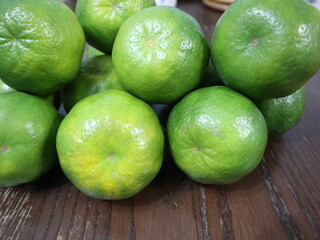 fresh food background of  green tangerines design for healthy diet