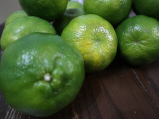 fresh food background of  green tangerines design for healthy diet