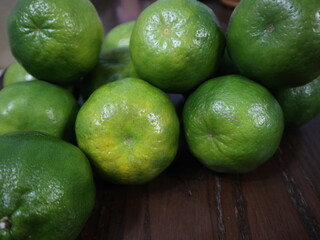 fresh food background of  green tangerines design for healthy diet