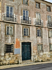 Old weathered building facade in southern Europe