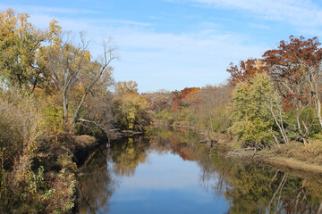 Des Plaines River with fall colors at Camp Ground Road Woods in Des Plaines, Illinois