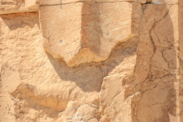 The wall is made of stone and has a rough texture, Acropolis in Athens
