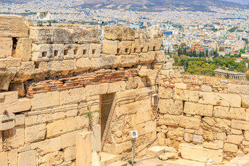 Fototapeta premium A stone building with a window and a small antenna on top, Acropolis in Athens