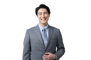 正面を向いて笑顔のスーツを着た若いビジネスマン　背景透明